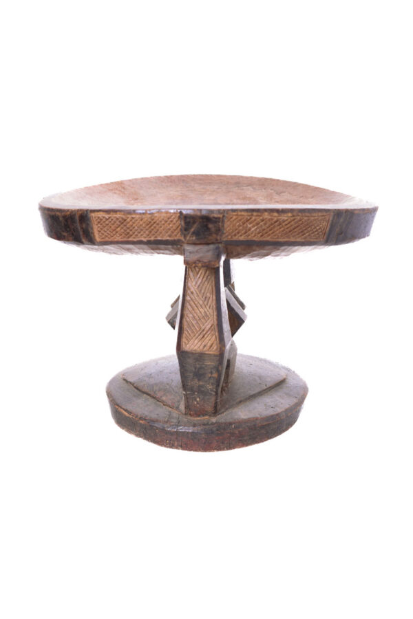 Vintage hand-carved from a single piece of wood. These stools were status symbols for elders of the nomadic Tonga people of Zimbabwe. They carry significant meaning, for the Tonga people