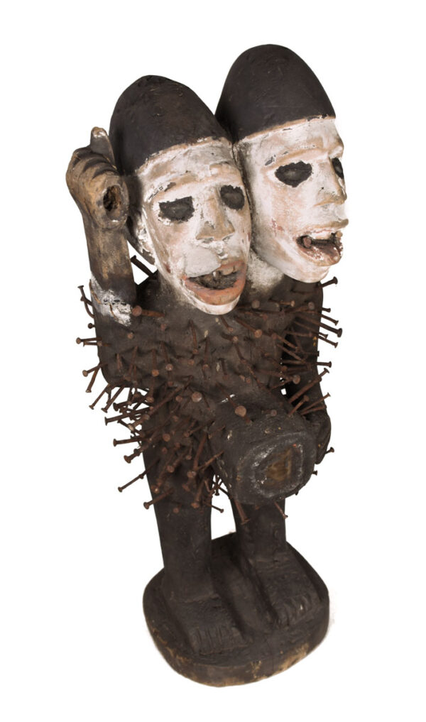 Double headed Nkisi Figure - Wood, nails, glass - Kongo- Congo