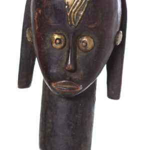 The wooden head is decorated with copper strips.