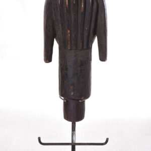 The wooden head is decorated with copper strips.