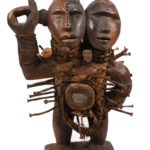 Double headed Nkisi Figure - Wood, nails, glass - Kongo- Congo