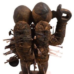 Double headed Nkisi Figure - Wood, nails, glass - Kongo- Congo