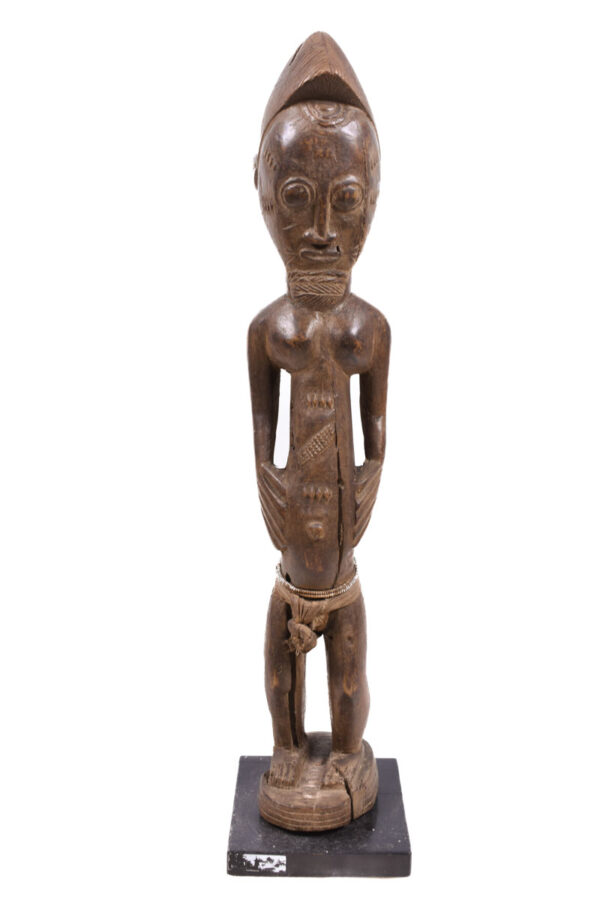 Ancestor figure - Baule - Wood - Ivory Coast This African mask of the Songola combines various stylistic indicators of the neighboring tribes,