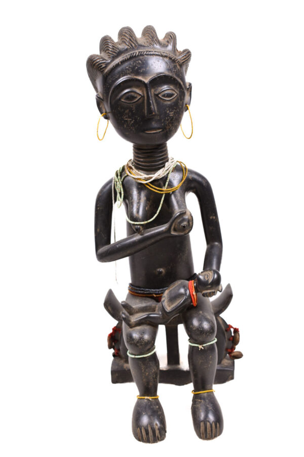 Maternity Figure - Wood - Asante - GhanaEthnic group: Lega Country: DR Congo Material: Wood Period: Mid 20th century Sold with stand: Yes Dimensions: 33x7x4 cm Weight: 230 gram Maternity Figure - Wood - Asante - Ghana